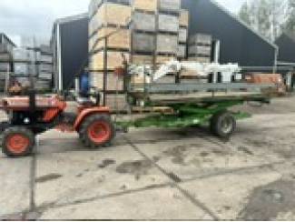 kubota met hoogwerker met rollerbaan